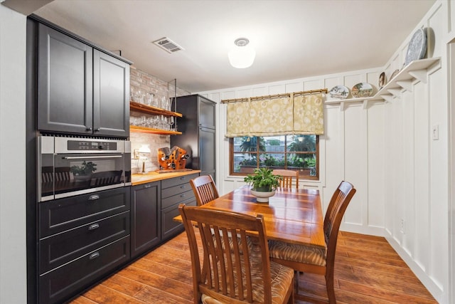1033 Gardendale Dr, Houston, TX 77018 - dining room with visible vents and hardwood / wood-style flooring