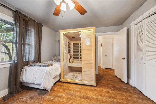 1033 Gardendale Dr, Houston, TX 77018 - bedroom featuring baseboards, a ceiling fan, a closet, and wood finished floors