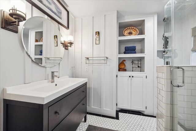 1033 Gardendale Dr, Houston, TX 77018 - bathroom with vanity, tile patterned floors, and a stall shower