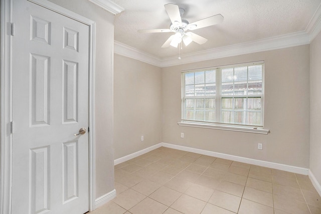 empty room featuring baseboards, a textured ceiling, ceiling fan, and light tile patterned floors