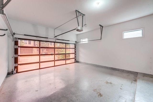 garage featuring a garage door opener