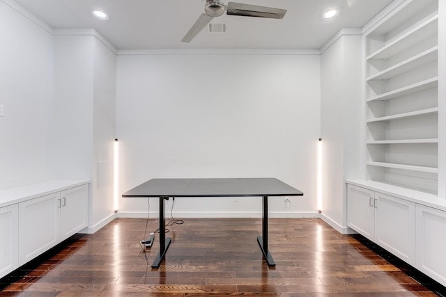 unfurnished office featuring recessed lighting, a ceiling fan, dark wood-style floors, and visible vents
