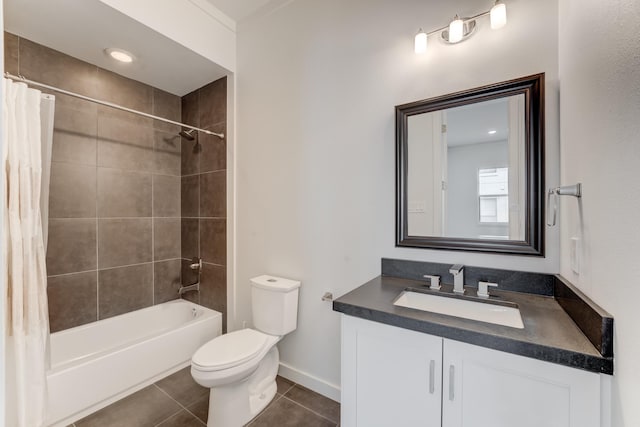 full bathroom featuring vanity, toilet, baseboards, shower / bathtub combination with curtain, and tile patterned floors