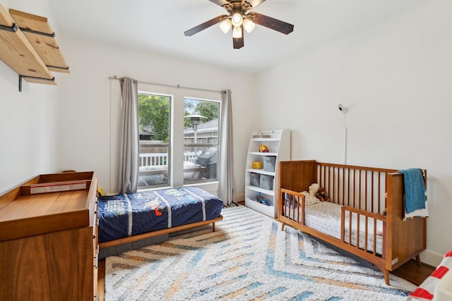 bedroom featuring ceiling fan and wood finished floors