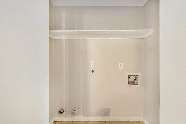 3622 Pine Ridge Ln, Houston, TX 77088 - clothes washing area with washer hookup, baseboards, electric dryer hookup, and visible vents