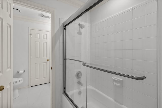 2215 Bay Haven Way, League City, TX 77573 - bathroom with toilet, shower / bath combination with glass door, and ornamental molding