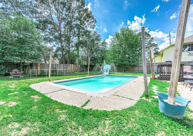 view of pool with a lawn, a fenced backyard, a deck, and a fenced in pool
