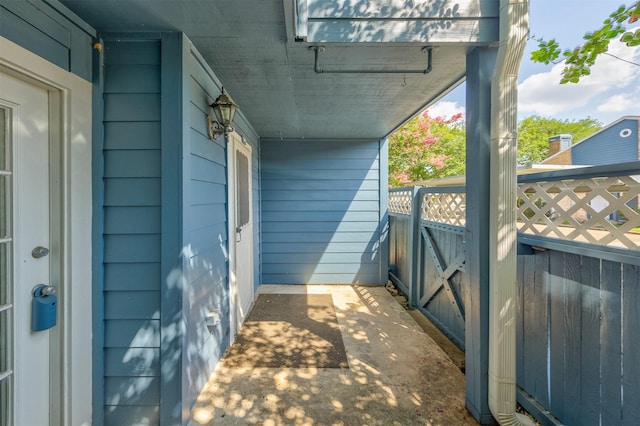 exterior space featuring fence and a gate