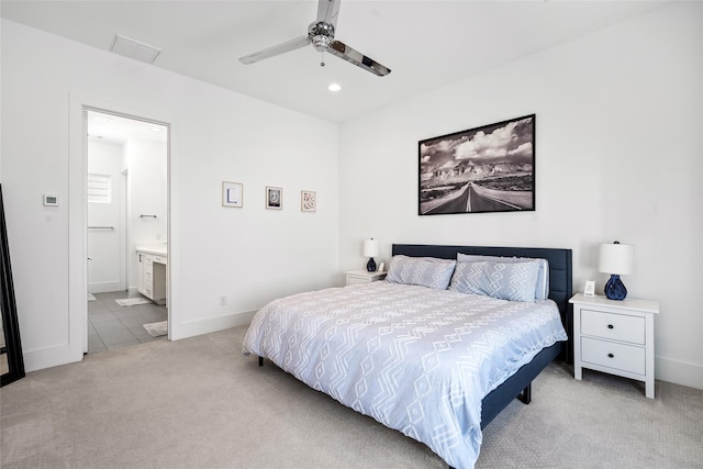 1023 Roberts St, Houston, TX 77003 - bedroom with light colored carpet, recessed lighting, baseboards, ensuite bathroom, and a ceiling fan