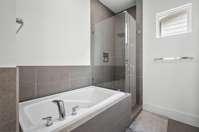 1023 Roberts St, Houston, TX 77003 - full bathroom with a garden tub and a shower stall