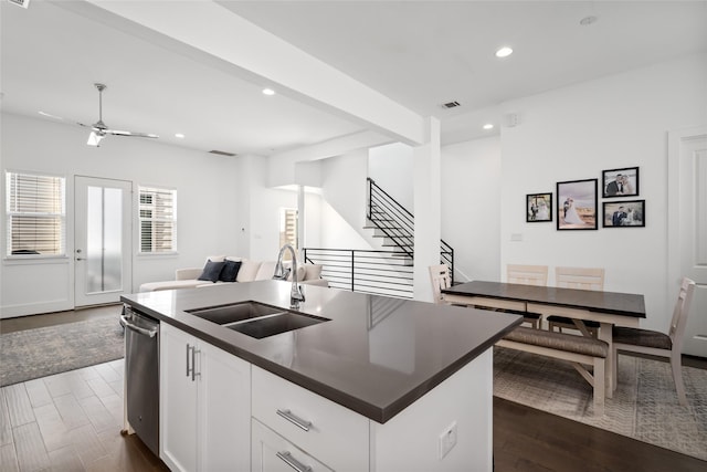 1023 Roberts St, Houston, TX 77003 - kitchen with a sink, open floor plan, dishwasher, dark countertops, and recessed lighting