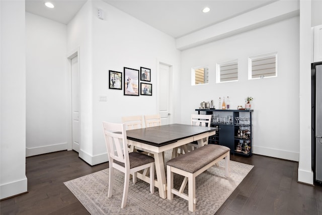 1023 Roberts St, Houston, TX 77003 - dining area featuring dark wood-type flooring, recessed lighting, and baseboards