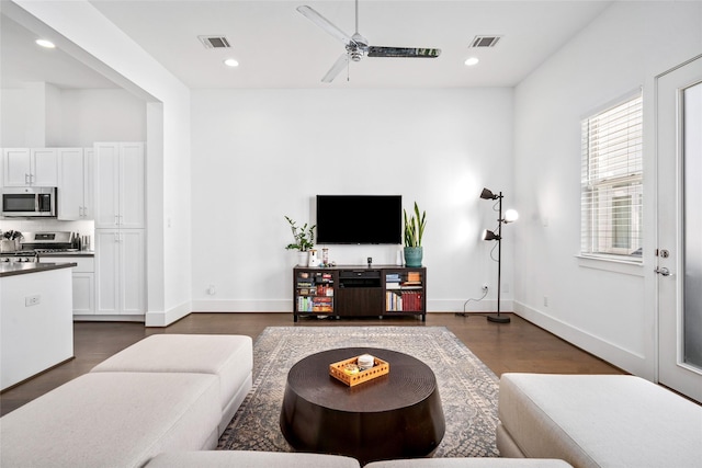 1023 Roberts St, Houston, TX 77003 - living room featuring a ceiling fan, dark wood-style floors, recessed lighting, and baseboards