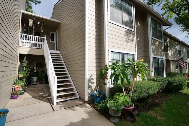 view of building exterior with stairs