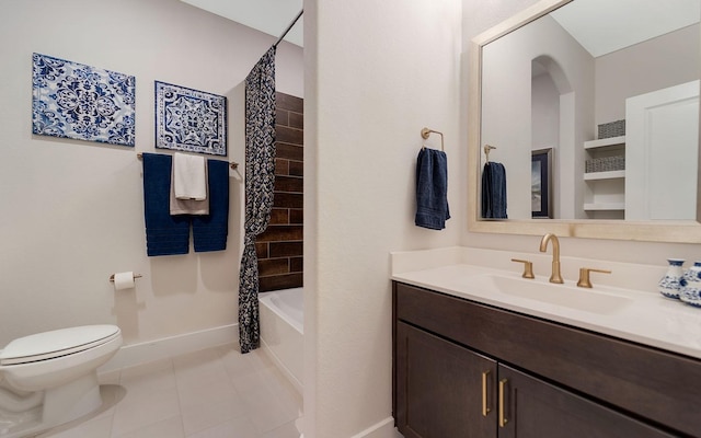 full bath with tile patterned flooring, baseboards, toilet, and vanity