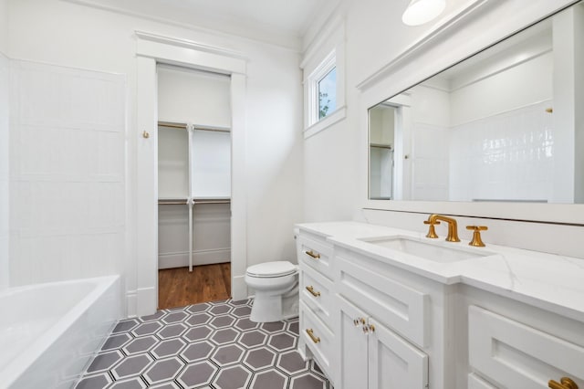 1623 Blount St, Houston, TX 77008 - full bath featuring toilet, vanity, tile patterned floors, and a spacious closet