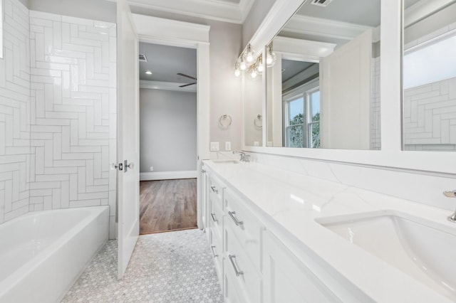1623 Blount St, Houston, TX 77008 - bathroom featuring crown molding, double vanity, baseboards, bathtub / shower combination, and recessed lighting