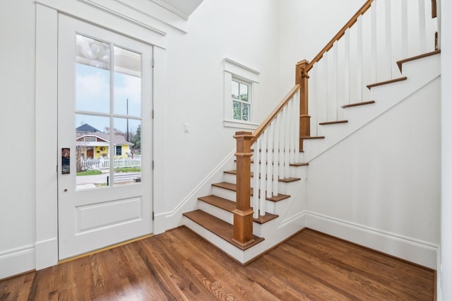 1623 Blount St, Houston, TX 77008 - foyer with wood finished floors, stairs, and healthy amount of natural light