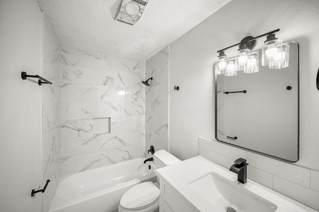 bathroom featuring vanity,  shower combination, a textured ceiling, and toilet