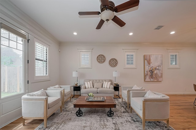 living room featuring crown molding, recessed lighting, and ceiling fan