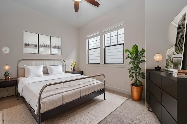 bedroom with baseboards and ceiling fan