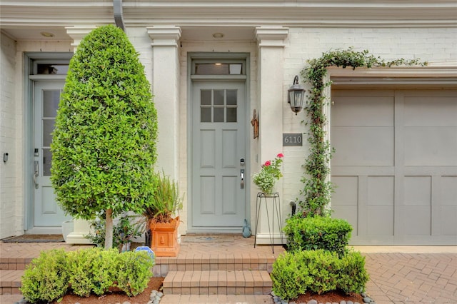 entrance to property featuring a garage