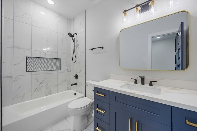 bathroom with vanity, marble finish floor, bathing tub / shower combination, and toilet