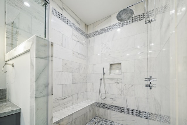 bathroom featuring a stall shower