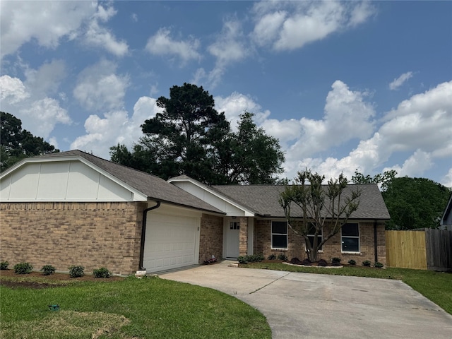 ranch-style house featuring a garage, a front lawn, fence, and concrete driveway