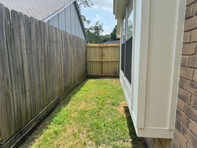 view of yard with fence