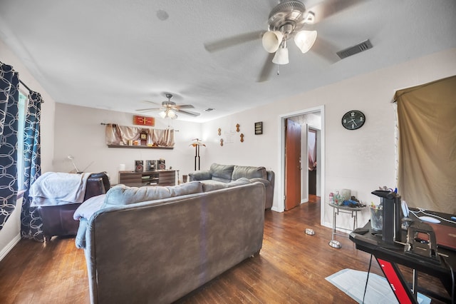 116 Chestnut St, Lake Jackson, TX 77566 - living room featuring visible vents, baseboards, ceiling fan, and wood finished floors