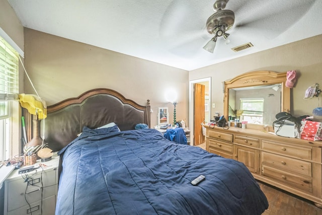 116 Chestnut St, Lake Jackson, TX 77566 - bedroom featuring ceiling fan, visible vents, and wood finished floors