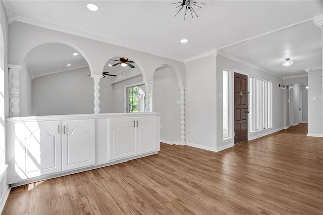 18330 Cape Bahamas Ln, Houston, TX 77058 - unfurnished room featuring ceiling fan, light wood finished floors, arched walkways, recessed lighting, and baseboards