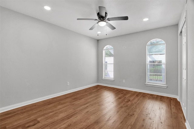 18330 Cape Bahamas Ln, Houston, TX 77058 - spare room featuring a ceiling fan, baseboards, recessed lighting, and hardwood / wood-style floors