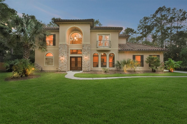 4014 N Rondelet Dr, Spring, TX 77386 - mediterranean / spanish-style home featuring a lawn, french doors, and a tile roof