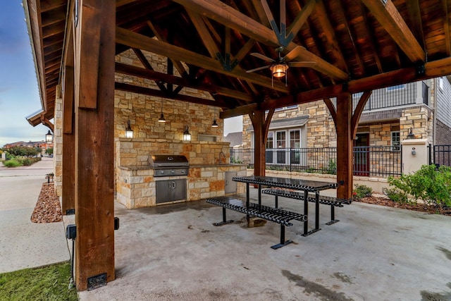 view of patio / terrace featuring area for grilling, a gazebo, fence, and ceiling fan