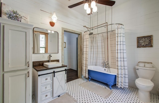 14203 Cypress Creek Blvd, Cypress, TX 77429 - full bathroom with ceiling fan, toilet, and vanity
