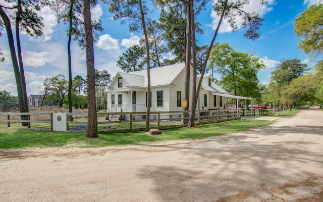 14203 Cypress Creek Blvd, Cypress, TX 77429 - view of side of property featuring metal roof