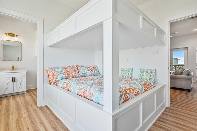 bedroom with light wood-style floors
