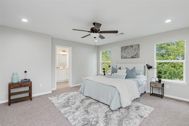 bedroom with visible vents, recessed lighting, baseboards, and light carpet