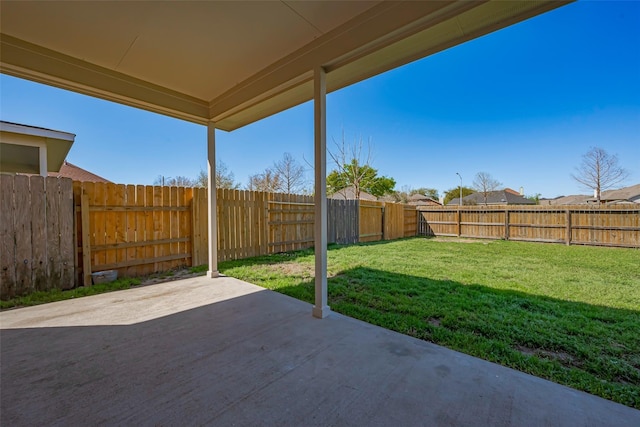 view of patio with a fenced backyard