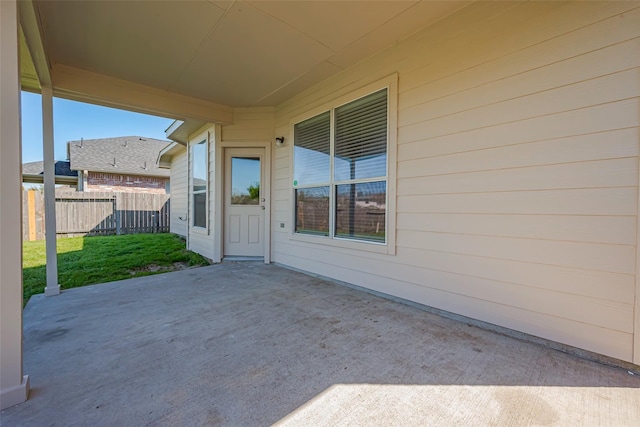 view of patio with fence