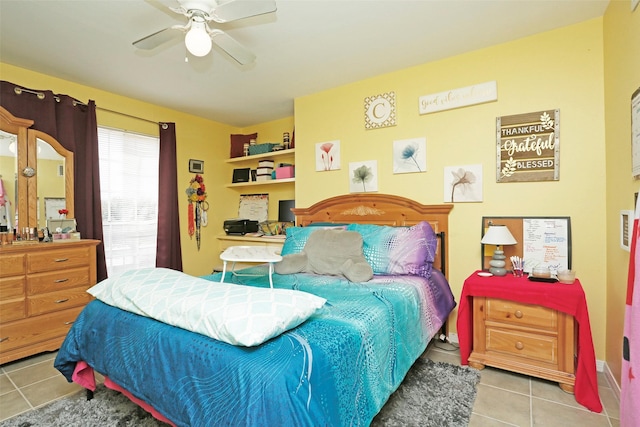 bedroom featuring tile patterned flooring and a ceiling fan