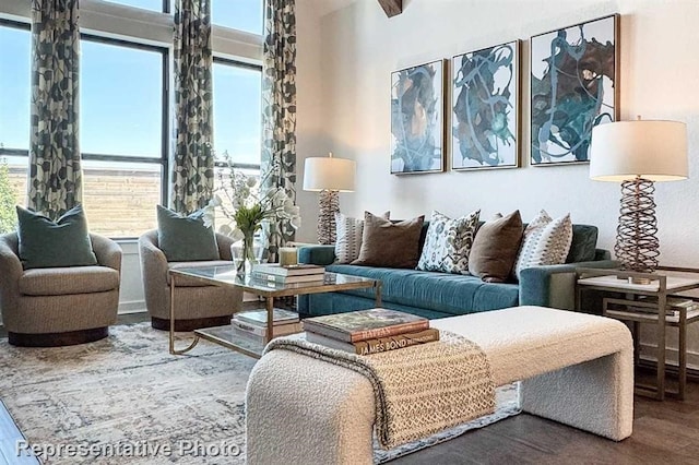 17708 Monarch Vista Ln, Conroe, TX 77302 - living room featuring wood finished floors and plenty of natural light