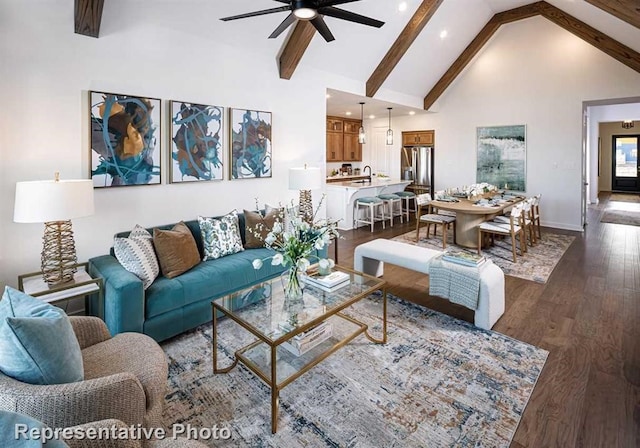 17708 Monarch Vista Ln, Conroe, TX 77302 - living area with ceiling fan, high vaulted ceiling, dark wood-style flooring, beam ceiling, and recessed lighting