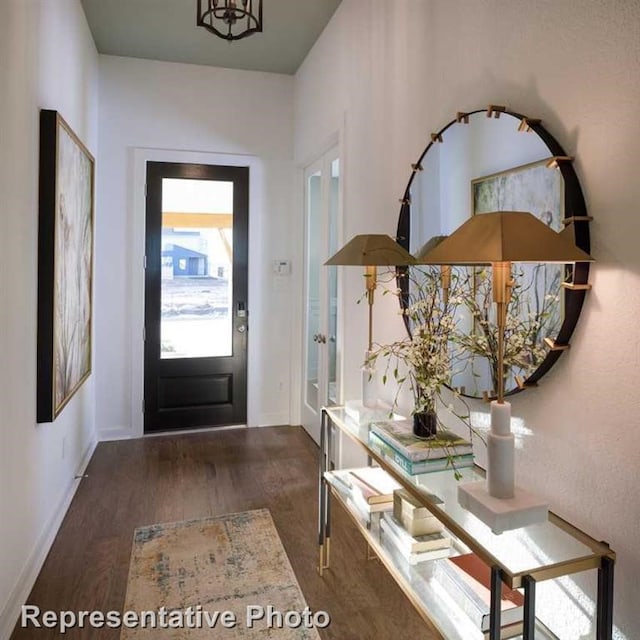 17708 Monarch Vista Ln, Conroe, TX 77302 - entrance foyer featuring wood finished floors and baseboards