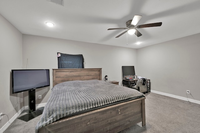 bedroom with carpet floors, baseboards, ceiling fan, and visible vents