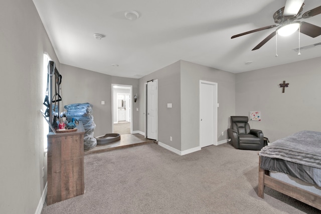 carpeted bedroom featuring a ceiling fan, baseboards, and visible vents