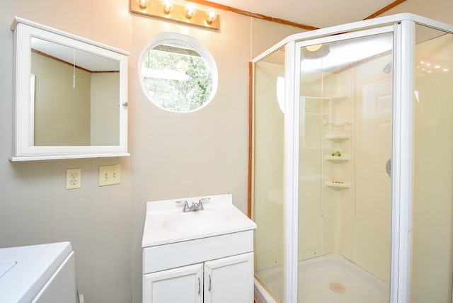 bathroom featuring vanity and a stall shower