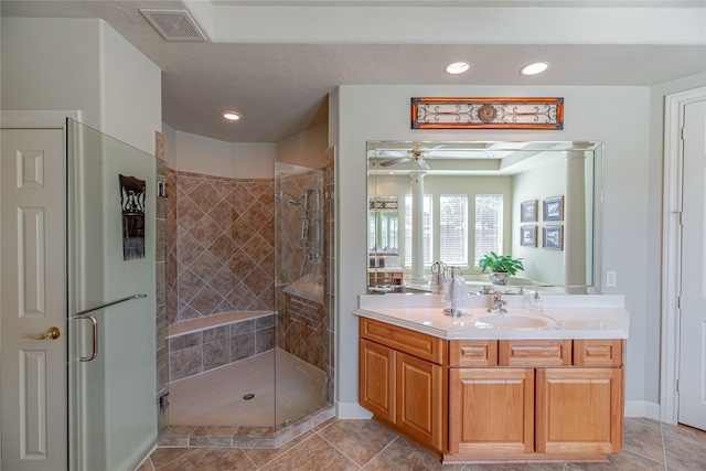bathroom with visible vents, tile patterned flooring, and a stall shower